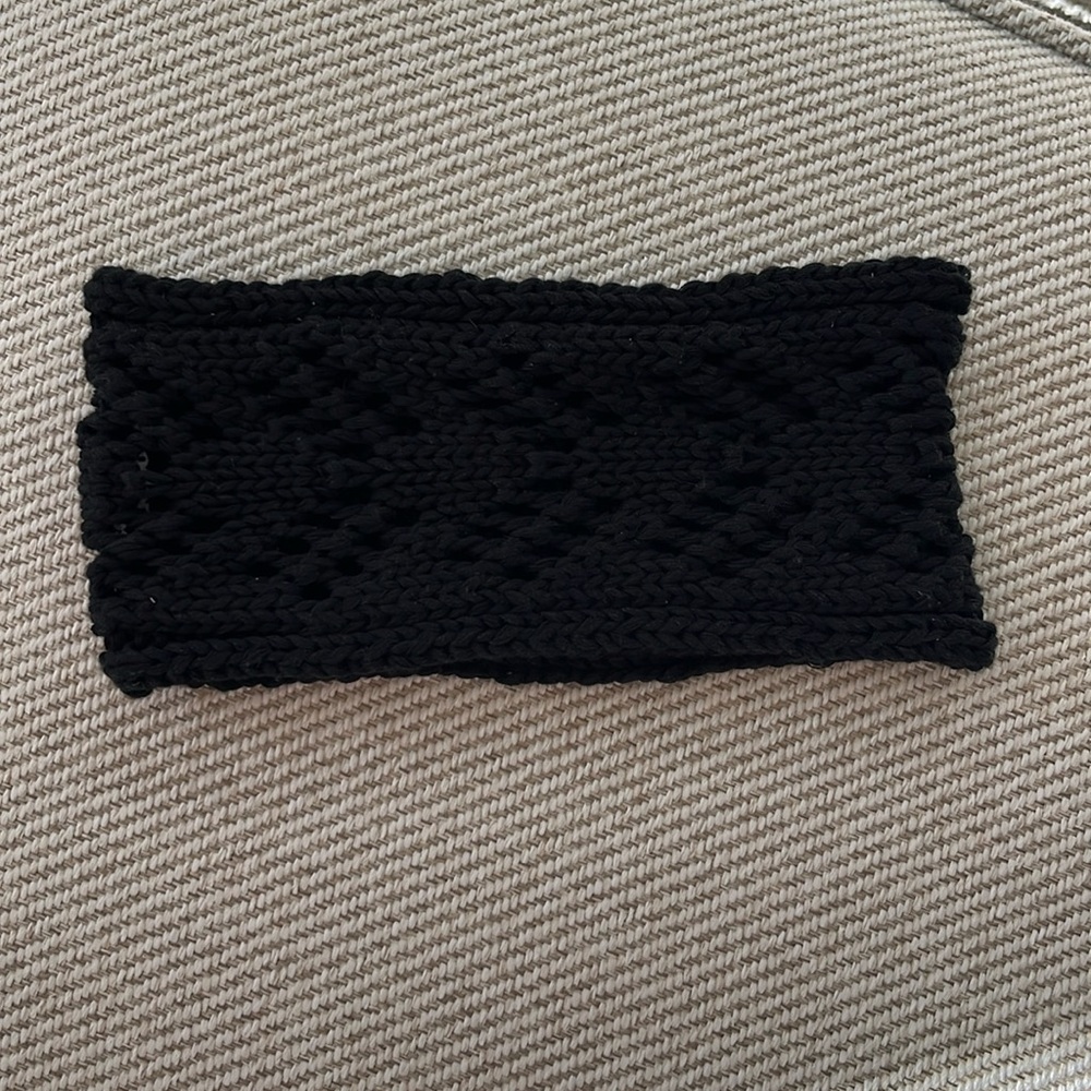 Black crocheted headband. NWOT